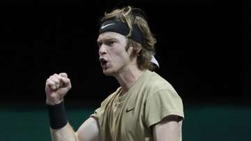 Russia's Andrey Rublev clenches his fist after winning the first set against Hungary's Marton Fucsovics in the final men's singles match of the ABN AMRO world tennis tournament at Ahoy Arena in Rotterdam, Netherlands, Sunday, March 7