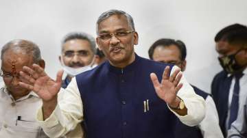 Uttarakhand Chief Minister Trivendra Singh Rawat addresses a press conference after tendering his resignation to Governor Baby Rani Maurya, in Dehradun.