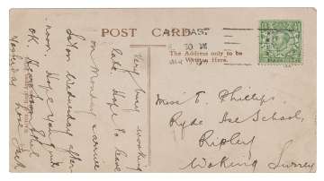 A photo copy of a postcard, provided by RR Auction, with a message written in March 1912 by the Titanic's senior wireless operator Jack Phillips, is shown with a postage stamp attached. The reverse side is dated May 31, 1911, and shows a photograph of the Titanic, in Belfast, Northern Ireland. The handwritten postcard was to Phillips' sister, Elsie Phillips. The postcard is to be auctioned by RR Auction. 