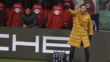 Leipzig's head coach Julian Nagelsmann reacts during the German Bundesliga soccer match between RB Leipzig and TSG 1899 Hoffenheim in Leipzig, Germany, Friday, April 16