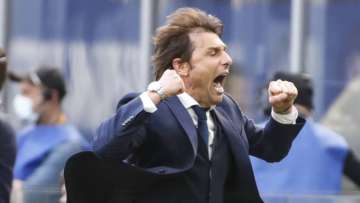 Inter Milan's head coach Antonio Conte celebrates his side's 1-0 win at the end of the Serie A soccer match between Inter Milan and Hellas Verona, at the San Siro stadium in Milan, Italy, Sunday, April 25