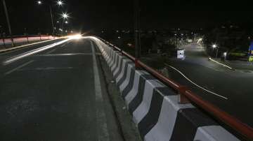 A view of a deserted street during a night curfew imposed as a precaution against the coronavirus.