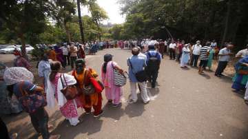 People queue up for COVID-19 vaccine in Mumbai.