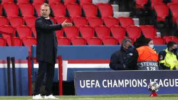 Bayern's head coach Hans-Dieter Flick reacts during the Champions League, second leg, quarterfinal soccer match between Paris Saint Germain and Bayern Munich at the Parc des Princes stadium, in Paris, France, Tuesday, April 13