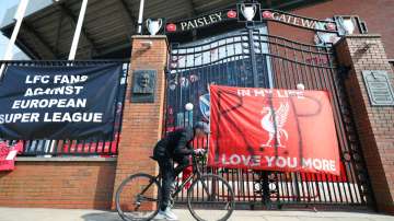 Liverpool owner leads Super League sorrow as fan anger grows