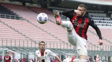 AC Milan's Ante Rebic in action during the Serie A soccer match between AC Milan and Genoa at the San Siro stadium in Milan, Italy, Sunday, April 18