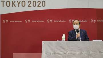 Toshio Muto, CEO of Tokyo 2020, attends a press conference after a Tokyo 2020 executive board meeting Monday, April 26, 2021 in Tokyo