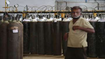 Oxygen cylinders are seen before they are delivered to different hospitals at a gas supplier facility.