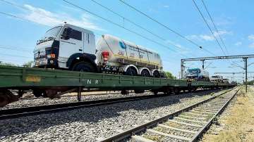 Oxygen tankers loaded on a train wagon arrive from Vishakapatnam via the special Oxygen Express, in Nashik district.