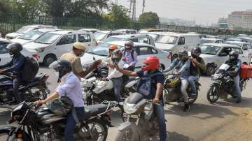Traffic jam at Delhi- Gurugram Expressway amid checks at the Delhi-Gurugram border near Sirhaul Toll Plaza, after Delhi Government announced complete lockdown for 6 days due to surge in coronavirus cases, in Gurugram.