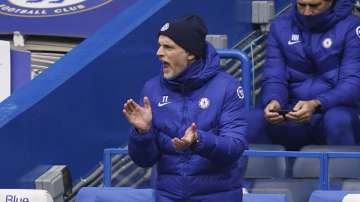 Chelsea manager Thomas Tuchel gives instructions during the English Premier League soccer match between Chelsea and West Bromwich Albion at Stamford Bridge stadium in London, England, Saturday, April 3