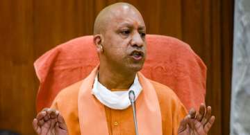 yogi adityanath, adityanath self isolation, up officials test positive, UP covid news