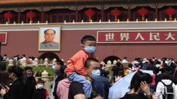 China’s ruling Communist Party eases birth limits, allows couples to have 3 children