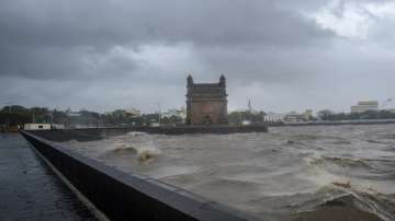 Indian Navy deploys 3 warships to rescue over 400 people onboard 2 barges adrift off Mumbai