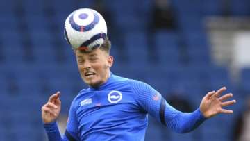 Brighton's Ben White warms up before the English Premier League soccer match between Brighton & Hove Albion and Manchester City at the Amex stadium in Brighton, England, Tuesday, May 18