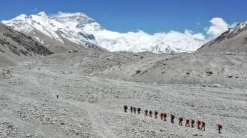Climbing guide says at least 100 coronavirus cases on Mount Everest
