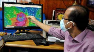 Kolkata: Deputy Director General of the Regional Meteorological Centre (RMC) Sanjib Bandyopadhyay monitors the progress of Cyclone Yaas, at RMC in Kolkata, Monday, May 24, 2021. 