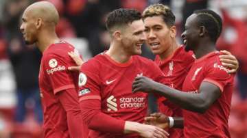 Liverpool's Sadio Mane, right, celebrates scoring his sides second goal during the English Premier League soccer match between Liverpool and Crystal Palace at Anfield stadium in Liverpool, England, Sunday, May 23