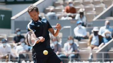 Russia's Daniil Medvedev plays a return to Kazakhstan's Alexander Bublik during their first round match on day two of the French Open tennis tournament at Roland Garros in Paris, France, Monday, May 31