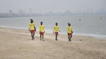 Lifeguards patrol at Girgaon Chowpatty due to formation of Cyclone Tauktae in the Arabian Sea in Mumbai.
