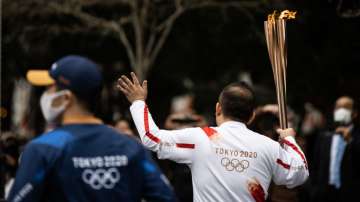 Olympic torch relay detour; diving test event opens in Tokyo