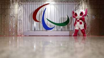 Someity, the official mascot for the 2020 Paralympic Games, presents a decoratio of the symbol of Paralympic Games called three 'agitos' after it's was unveiled after a ceremony to mark 100 days to go until the opening of the Tokyo 2020 Paralympic Games, which have been postponed to 2021 due to the coronavirus disease (COVID-19) outbreak, at Tokyo Metropolitan Government building on May 16