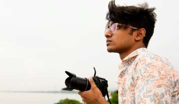 20-year-old Pubarun Basu bagged 'Sony World Photography Awards 2021' for his picture titled- 'No Escape from Reality'. 