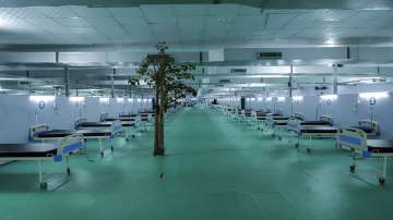 A tree stands at a facility for COVID-19 patients with 500 ICU beds that is being set up at Ramlila ground, a usual venue of major political rallies in New Delhi.