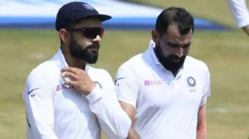 File photo of Virat Kohli (left) with Mohammed Shami.