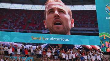 England fans stand for the anthem before the Euro 2020 soccer championship group D match between England and Croatia at Wembley stadium in London, Sunday, June 13