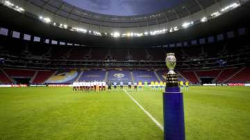 The Copa America trophy is placed on the field prior to the opening match between Brazil and Venezuela at National Stadium in Brasilia, Brazil, Sunday