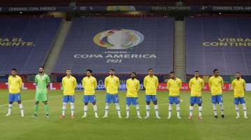 Brazil's players stand during the national anthem prior to a Copa America soccer match against Venezuela at the National Stadium in Brasilia, Brazil, Sunday, June 13