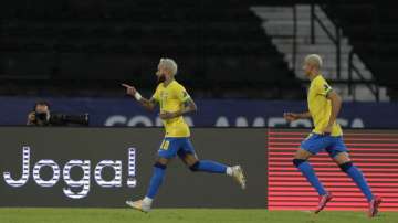 Brazil's Neymar, left, celebrates after scoring his side's 2nd goal during a Copa America soccer match against Peru at Nilton Santos stadium in Rio de Janeiro, Brazil, Thursday, June 17