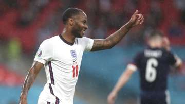 England's Raheem Sterling fives his thumb up during the Euro 2020 soccer championship group D match between England and Scotland at Wembley stadium in London, Friday, June 18