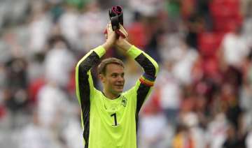 Germany's goalkeeper Manuel Neuer celebrates with fans after the Euro 2020 soccer championship group F match between Portugal and Germany in Munich, Saturday, June 19