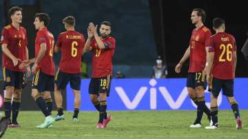 Spanish players react after the Euro 2020 soccer championship group E match between Spain and Poland at the La Cartuja stadium in Seville, Spain, Saturday, June 19