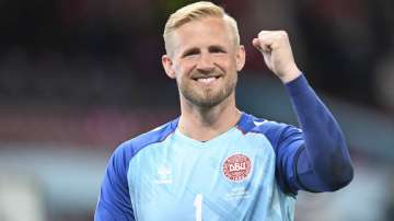 Denmark's goalkeeper Kasper Schmeichel celebrates after the Euro 2020 soccer championship group B match between Russia and Denmark at the Parken stadium in Copenhagen, Denmark, Monday, June 21