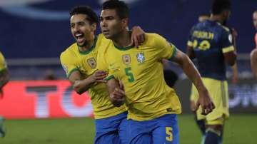 Brazil's Casemiro, right, celebrates with teammate Marquinhos after scoring his side's 2nd goal against Colombia during a Copa America soccer match at Nilton Santos stadium in Rio de Janeiro, Brazil, Wednesday, June 23