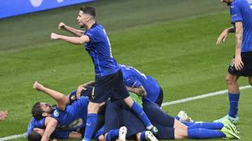 Italy's players celebrate after scoring their side's second goal during the Euro 2020 soccer championship round of 16 match between Italy and Austria at Wembley stadium in London, Saturday, June 26