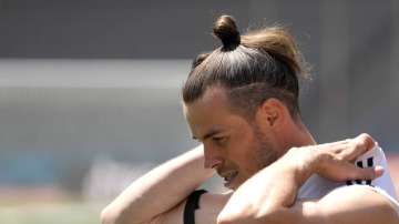 Wales' Gareth Bale gestures, during a practice session of the national soccer team of Wales, in Baku, Azerbaijan, Wednesday, June 9