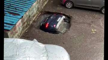 Car sinks into water as concrete floor caves in at Mumbai's Ghatkopar 