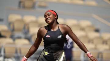 United States's Coco Gauff celebrates after defeating Tunisia's Ons Jabeur during their fourth round match on day 9, of the French Open tennis tournament at Roland Garros in Paris, France, Monday, June 7