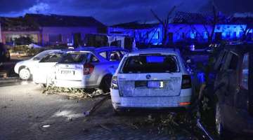 Cars and houses are damaged after a tornado hit the village of Moravska Nova Ves in the Hodonin district, South Moravia, Czech Republic, on Thursday, June 24