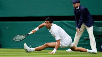 Wimbledon 2021: More slipping and sliding as Novak Djokovic wins