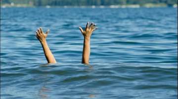 A few children playing nearby said Monis suddenly slipped into the water