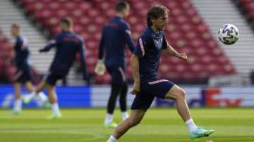 Croatia's Luka Modric controls the ball during a training session at the Hampden Park Stadium in Glasgow, Thursday, June 17