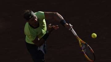 Spain's Rafael Nadal serves to Australia's Alexei Popyrin during their first round match on day three of the French Open tennis tournament at Roland Garros in Paris, France, Tuesday, June 1