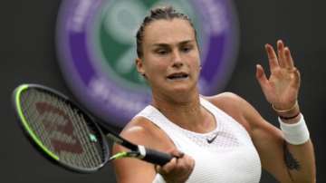Belarus's Aryna Sabalenka returns the ball to Romania's Monica Niculescu during their first round women's singles match on day one of the Wimbledon Tennis Championships in London, Monday June 28