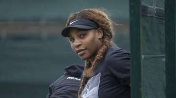 USA's Serena Williams prepares for a practice session, ahead of the Wimbledon Tennis Championships, in London, Sunday, June 27