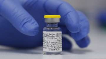 Vial of the Phase 3 Novavax coronavirus vaccine is seen ready for use in the trial at St. George's University hospital in London.